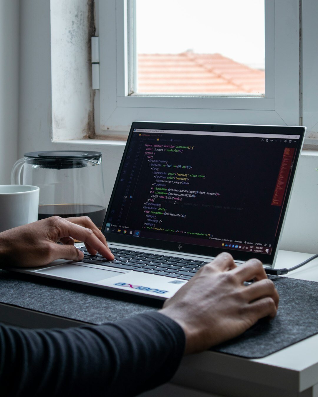 programmer writing insurance code